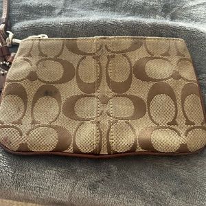Coach Corner Zip Wristlet In Signature Canvas